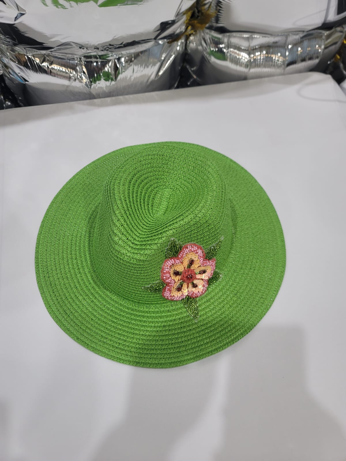 FLOWERED GREEN HAT